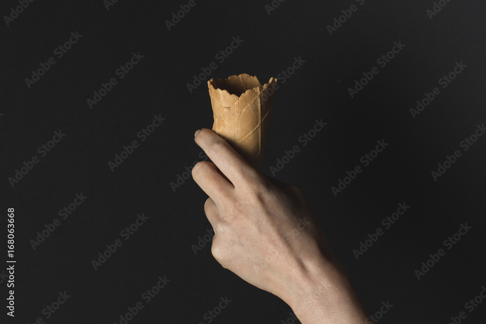 hand holding wafer cone