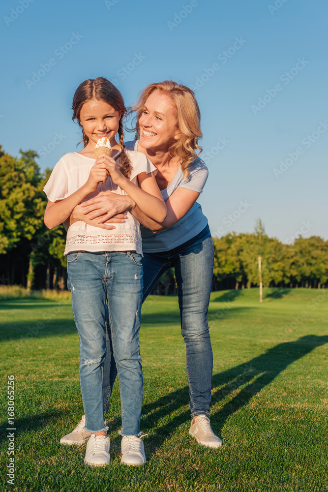 grandmother and kid with ice cream