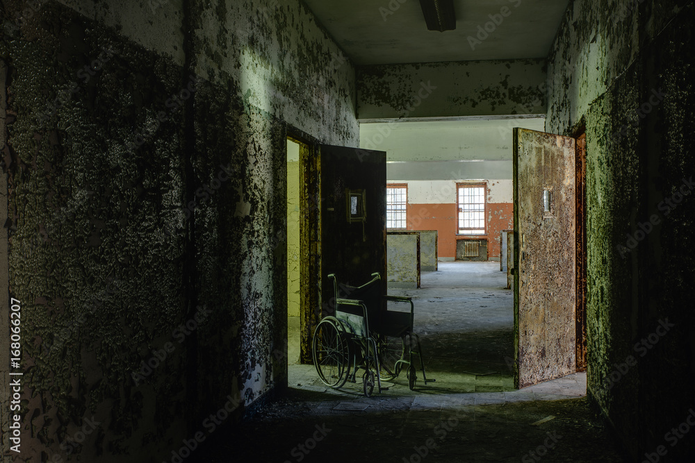 Hallway with Vintage Wheelchair & Open Doors - Abandoned Hospital