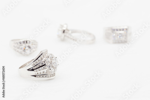 Diamond wedding rings on the white. selective focus © kaiskynet