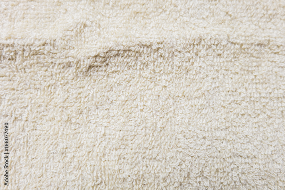 The texture of light brown bath towel,soft focus The texture of light brown bath towel,soft focus