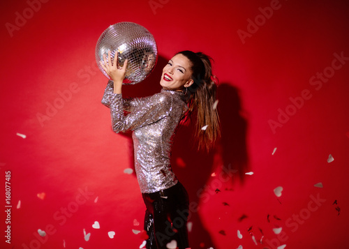 Woman with disco ball 