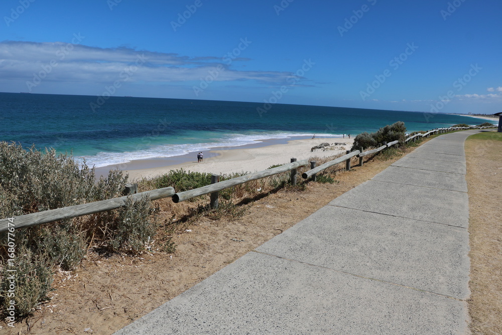 Bike path at Indian Ocean and Cottesloe Beach in summer, Western Australia 