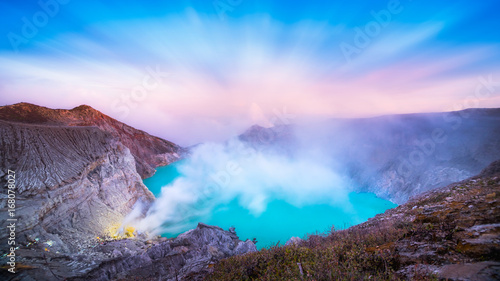 Landscape panorama view of Kawah Ijen at Sunrise. The most famous tourist attraction in Indonesia.
