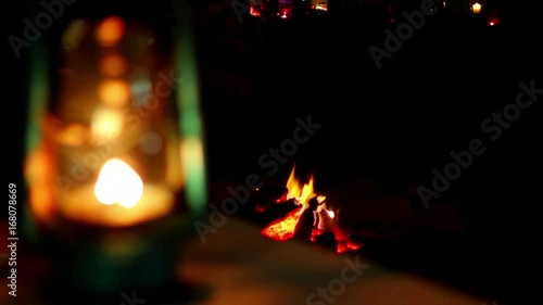 Focus pull from a lantern to a camp fire