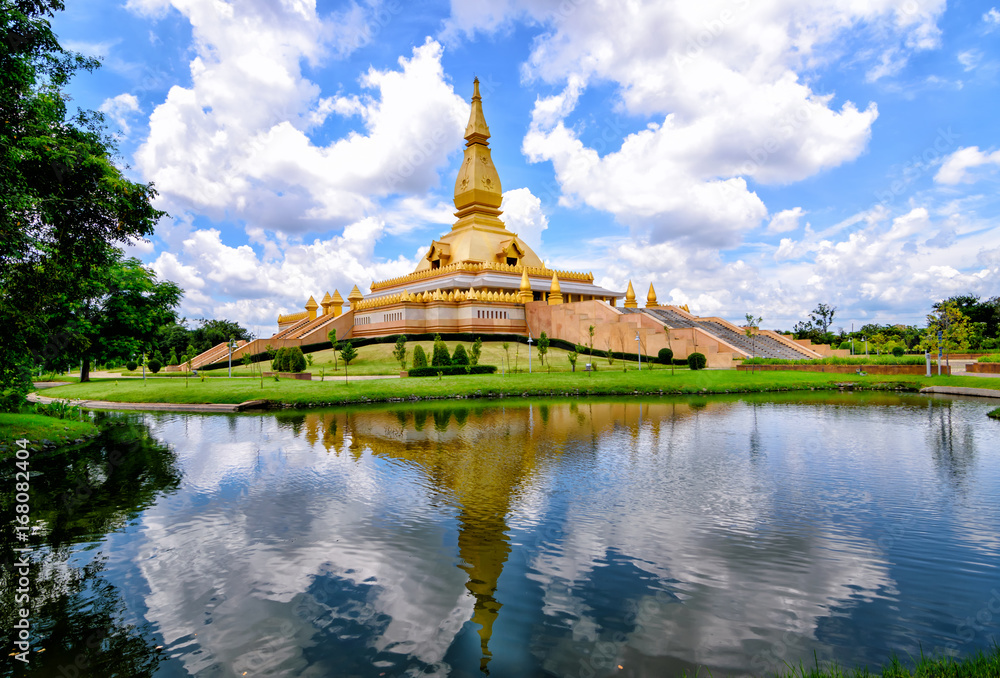 golden Stupa name Mahamongkoljedhi with blue sky and clouds background in Thailand golden Stupa name Mahamongkoljedhi with blue sky and clouds background in Thailand