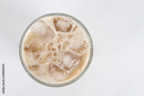 Ice tea with milk over white background