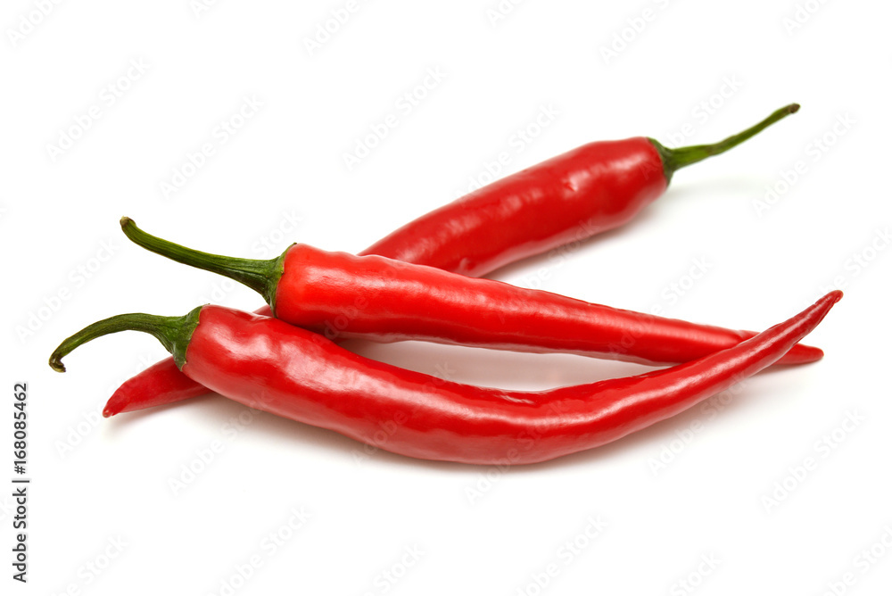 Red chili peppers isolated on white background. Flat lay, top view