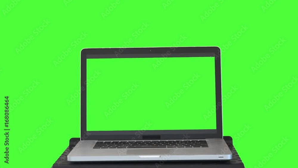 Opening Green Screen Laptop. Male hands opening a green screen laptop