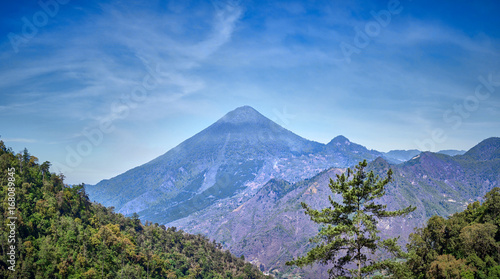 Santa María Volcano behind a valley / This is a large active volcano in the western highlands of Guatemala next to the city of Quetzaltenango