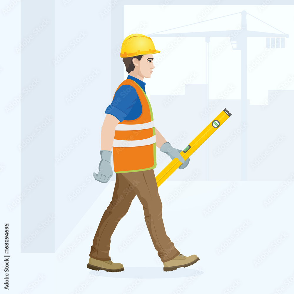 A man is a construction worker in overalls in the workplace with a tool in his hands. Vector illustration. A man is a construction worker in overalls in the workplace with a tool in his hands. Vector illustration.