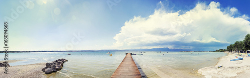 Fototapeta Naklejka Na Ścianę i Meble -  Panoramic view of the coast of Lake Garda