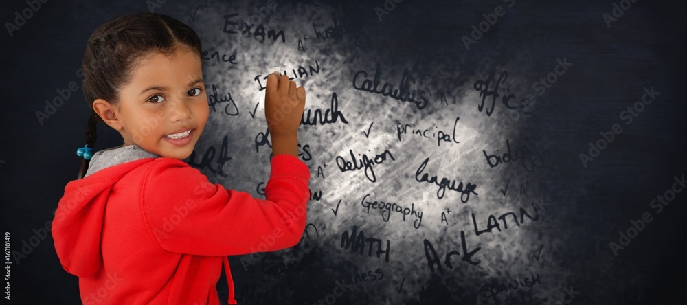 Composite image of portrait of smiling girl holding chalk Composite image of portrait of smiling girl holding chalk