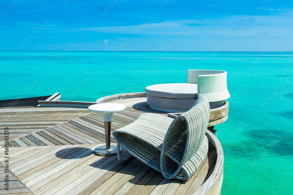 Obraz premium Chill lounge zone on the sandy beach, Maldives island