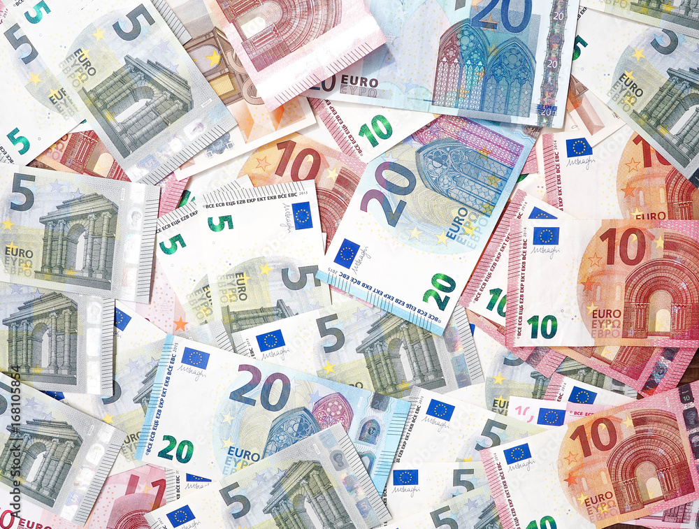Euro banknotes as a background, a lot of cash, coins, concept, economy growth, currency, crypto currency, new technology