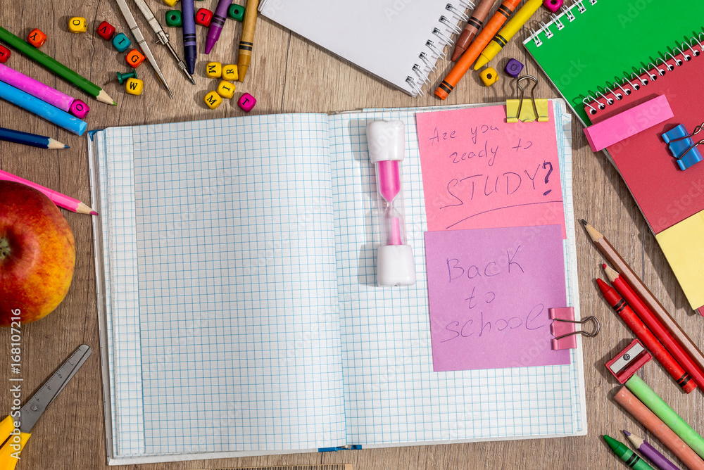 text back to school write on notepad with different school supplies text back to school write on notepad with different school supplies