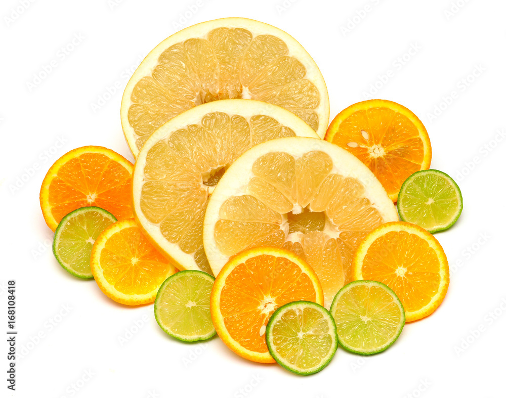 Fruit of citrus orange, lime and pomelo sliced isolated on white background. A healthy and nutritious food for health after training in sports for burning fat. Flat lay, top view Fruit of citrus orange, lime and pomelo sliced isolated on white background. A healthy and nutritious food for health after training in sports for burning fat. Flat lay, top view