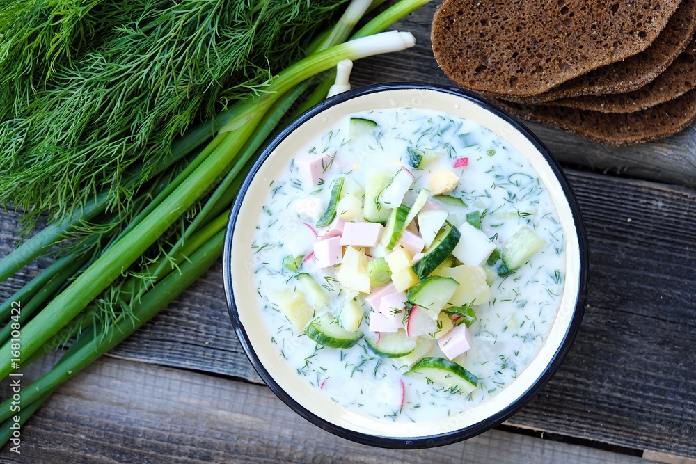 Delicious cold soup okroshka and fresh herbs Delicious cold soup okroshka and fresh herbs
