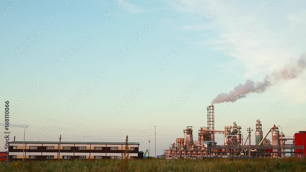 Exhaust from the plant to the atmosphere of the sky with a production plant Exhaust from the plant to the atmosphere of the sky with a production plant