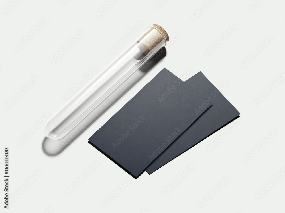 Empty beaker with two balck business cards. 3d rendering Empty beaker with two balck business cards. 3d rendering