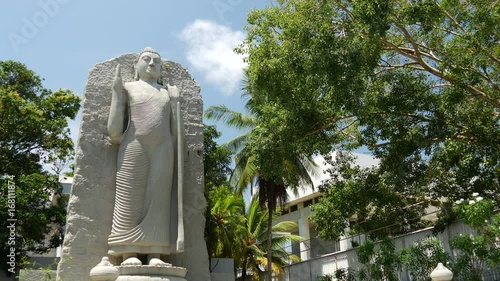 Aukana buddha statue in Colombo, Sri Lanka photo