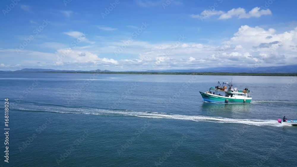 Fishing boat leaving Puntarenas in Costa Rica Fishing boat leaving Puntarenas in Costa Rica
