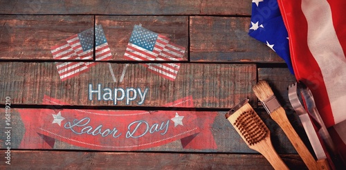 Fotografia Composite image of happy labor day text badge with flags