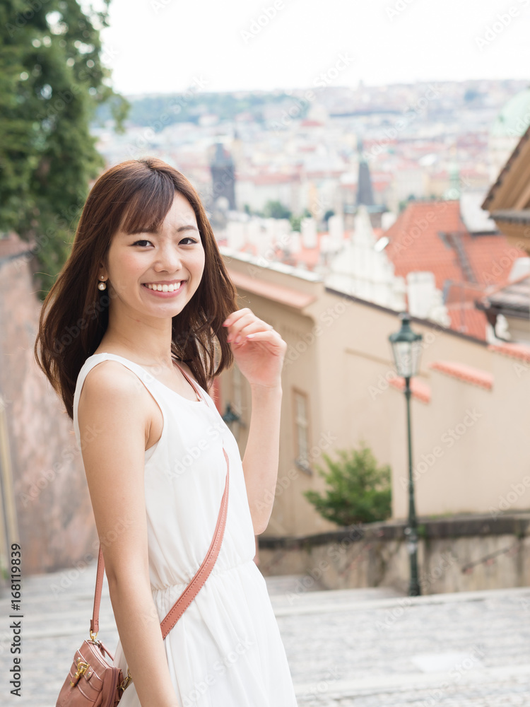 portrait of young asian woman traveling in europe