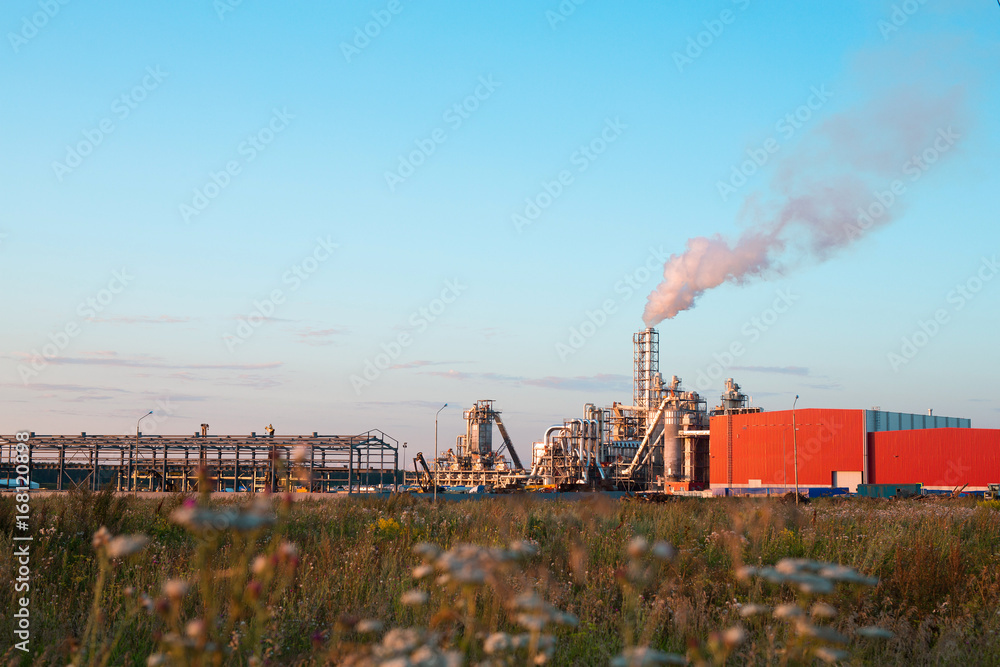 Exhaust from the plant to the atmosphere of the sky with a production plant Exhaust from the plant to the atmosphere of the sky with a production plant