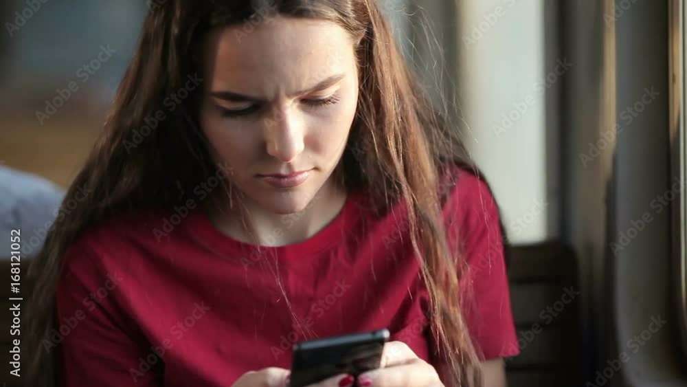 Close-up view of woman holding smartphone Close-up view of woman holding smartphone