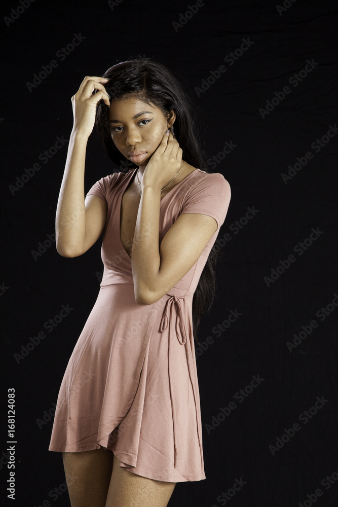 Woman with hand on head Woman with hand on head