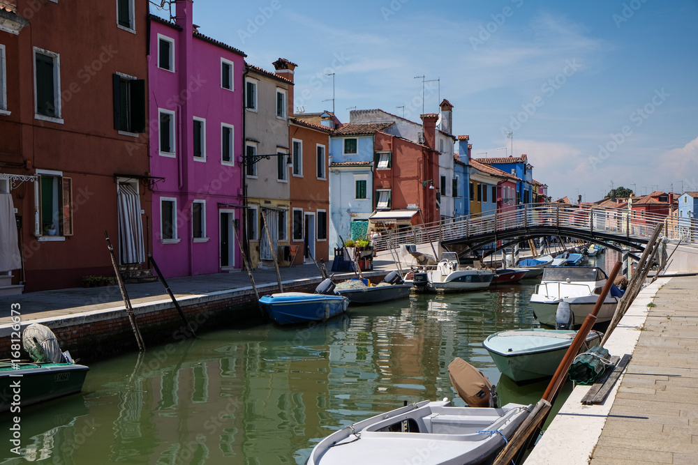 The boats and houses on the Burano canal