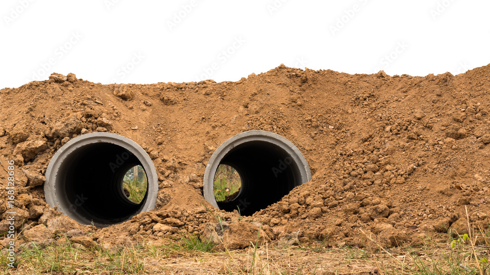 Both concrete pipes are buried in the soil.