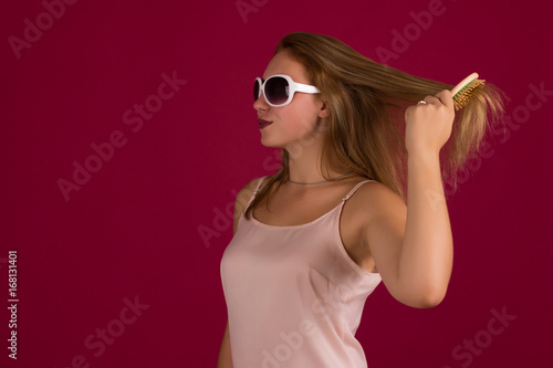 Wallpaper Mural Young cute girl with comb, studio   Torontodigital.ca