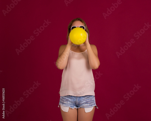 Young pretty girl with balloon, party 