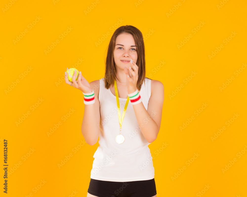 Young pretty woman with tennis ball, studio Young pretty woman with tennis ball, studio