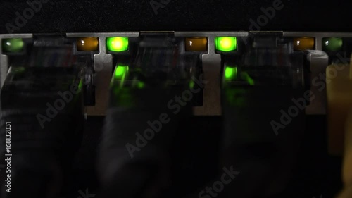 Network equipment with blinking LEDs (4K footage) photo