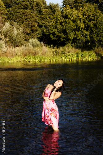 Attractive Japanese American Woman Standing In River © jeffwqc
