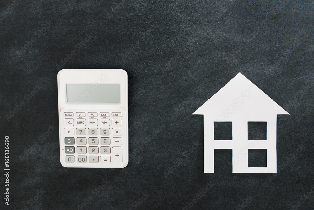 estate investment with calculator and paper model estate investment with calculator and paper model