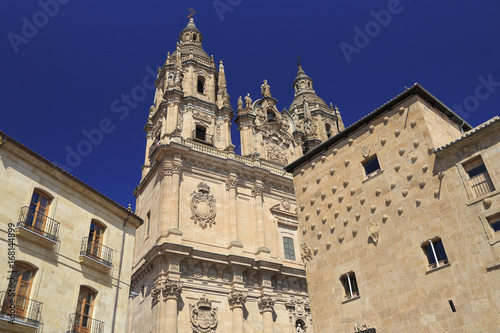 Salamanca Clerecia church and Casa Conchas shell house in Spain