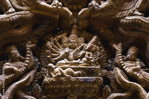 wood craft of lord bhairava sculpted on archway according to belief of people in Nepal for guarding the door preventing evil enter temple or home