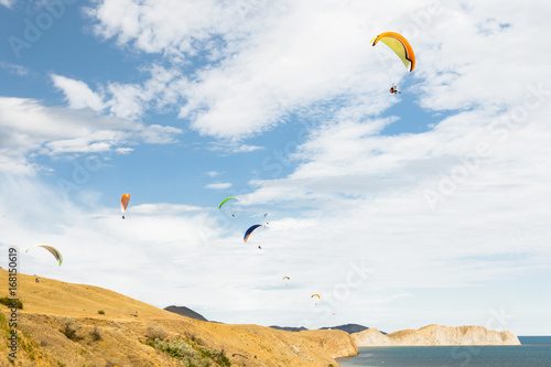 paraplane flying high up photo