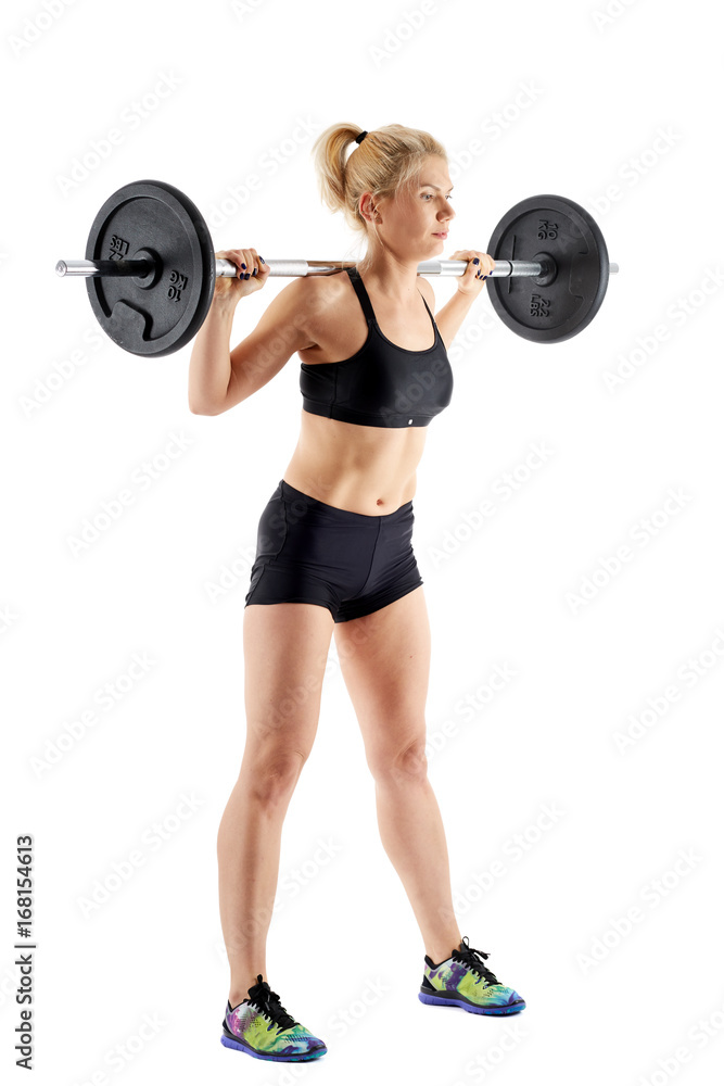 Obraz premium Woman doing barbell squats