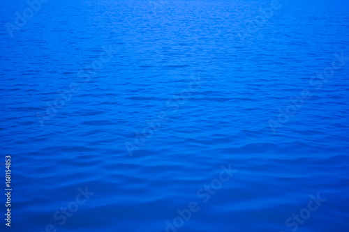 Blur image of the river, lake, sea or ocean. Abstract background.