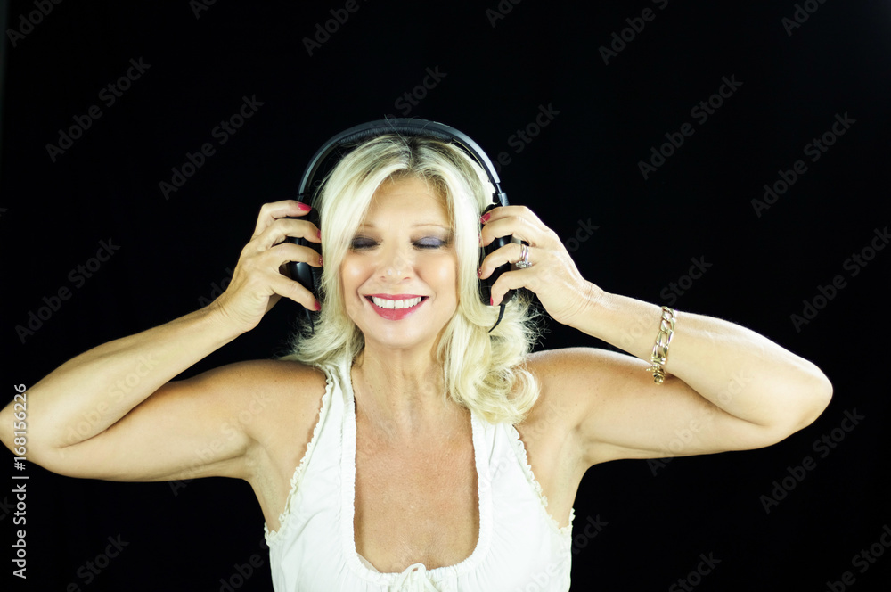 female tango DJ with headphones isolated on black background female tango DJ with headphones isolated on black background