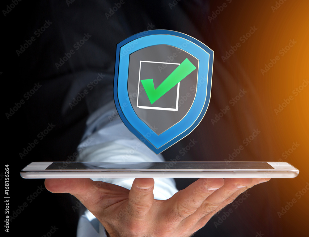 Shield symbol displayed on a futuristic interface - Security and internet concept Shield symbol displayed on a futuristic interface - Security and internet concept