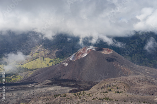 Barujari volcano or Baby Rinajni volcano in cloudy day, Lombok island, Indonesia