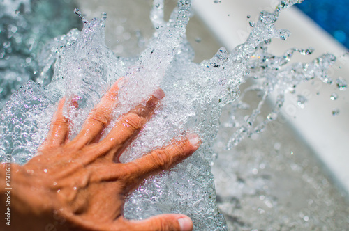 Hand with water splash