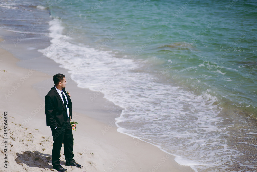 Portrait of the groom on a wedding day walk Portrait of the groom on a wedding day walk