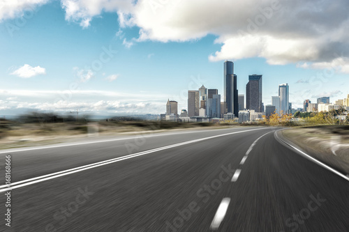 empty road with cityscape of modern city